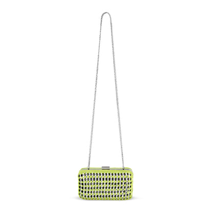 Lime green embellished clutch suspended from a delicate silver chain, showcasing its wearable crossbody length.