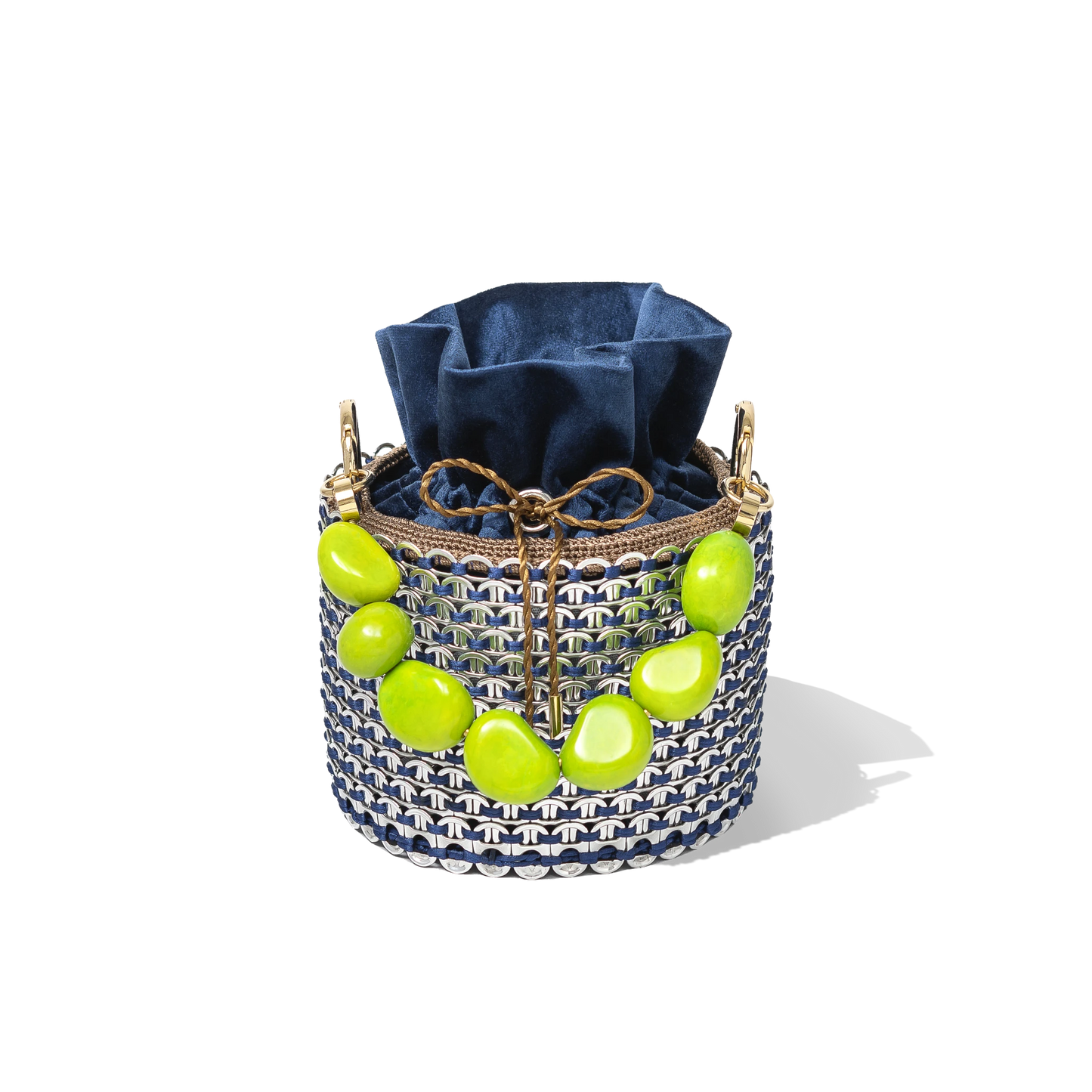 Top view of the Leonard Bucket Bag showcasing the contrast between the deep navy pouch and the vivid green crystal detailing around the rim.