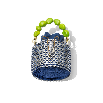 Back view of the Leonard Bucket Bag highlighting the structural beaded handle in lime tones and the seamless navy mesh base.