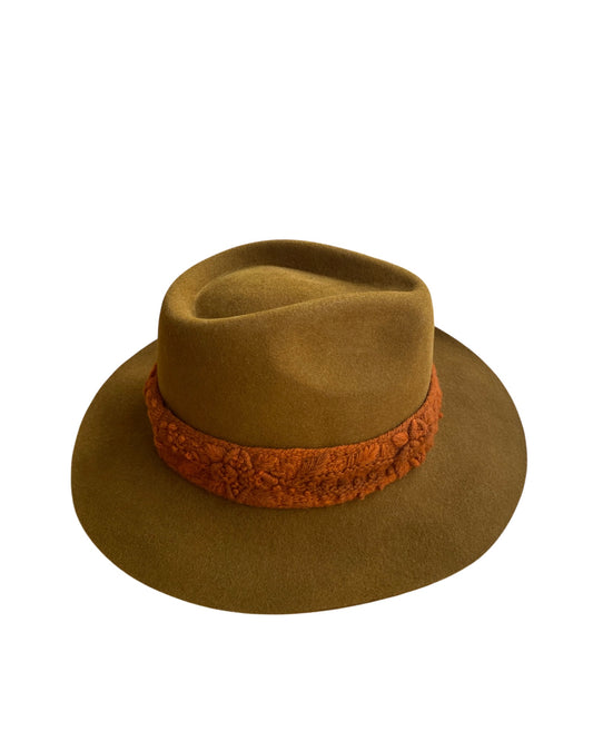 Rear angled view of the Walnut fedora hat highlighting the seamless blend of its warm-toned felt and bold contrast band.

