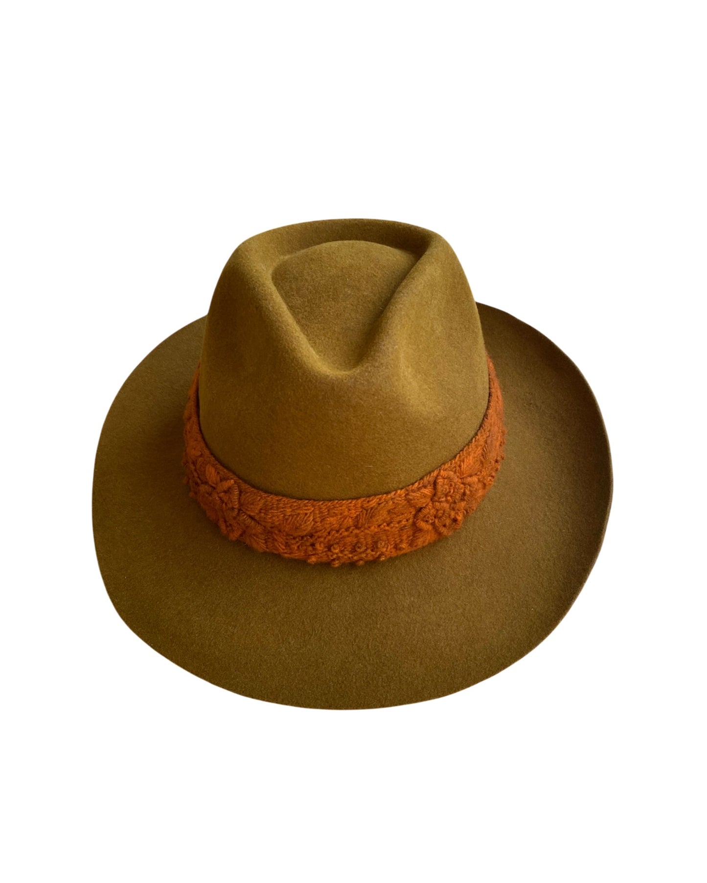 Side angle view of the Walnut fedora, showing the rich earthy hue and vibrant handwoven orange band wrapping around the crown.
