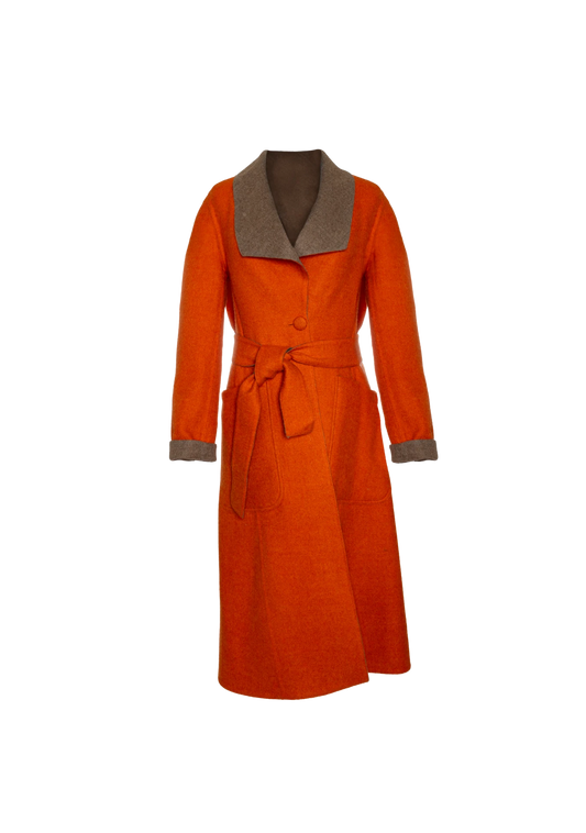 Front view of the Agnes Revers Coat in orange with taupe collar, photographed in Vienna, Austria – statement slow fashion by My Paloma.