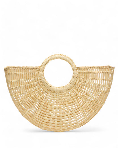 Side-angle flat lay of the Sailor Moon Tote, showcasing its semi-circular build, intricate weave pattern, and compact structure.