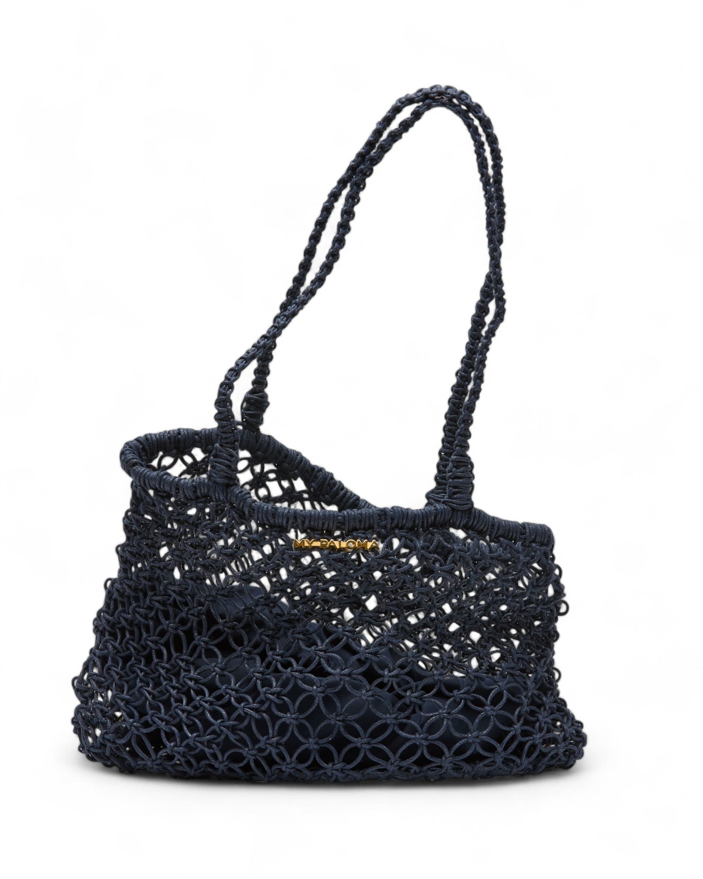 Hand-crocheted navy Sapphire Moon Clutch displayed against a white background, featuring dual looped handles and a soft, flexible shape.