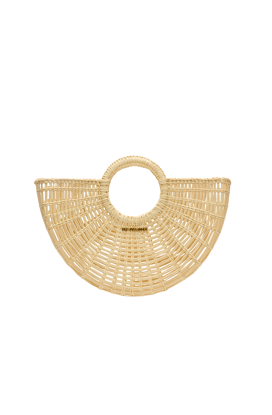 Front view of the Sailor Moon Tote, handwoven in natural toquilla straw with a circular handle and fan-shaped silhouette.

