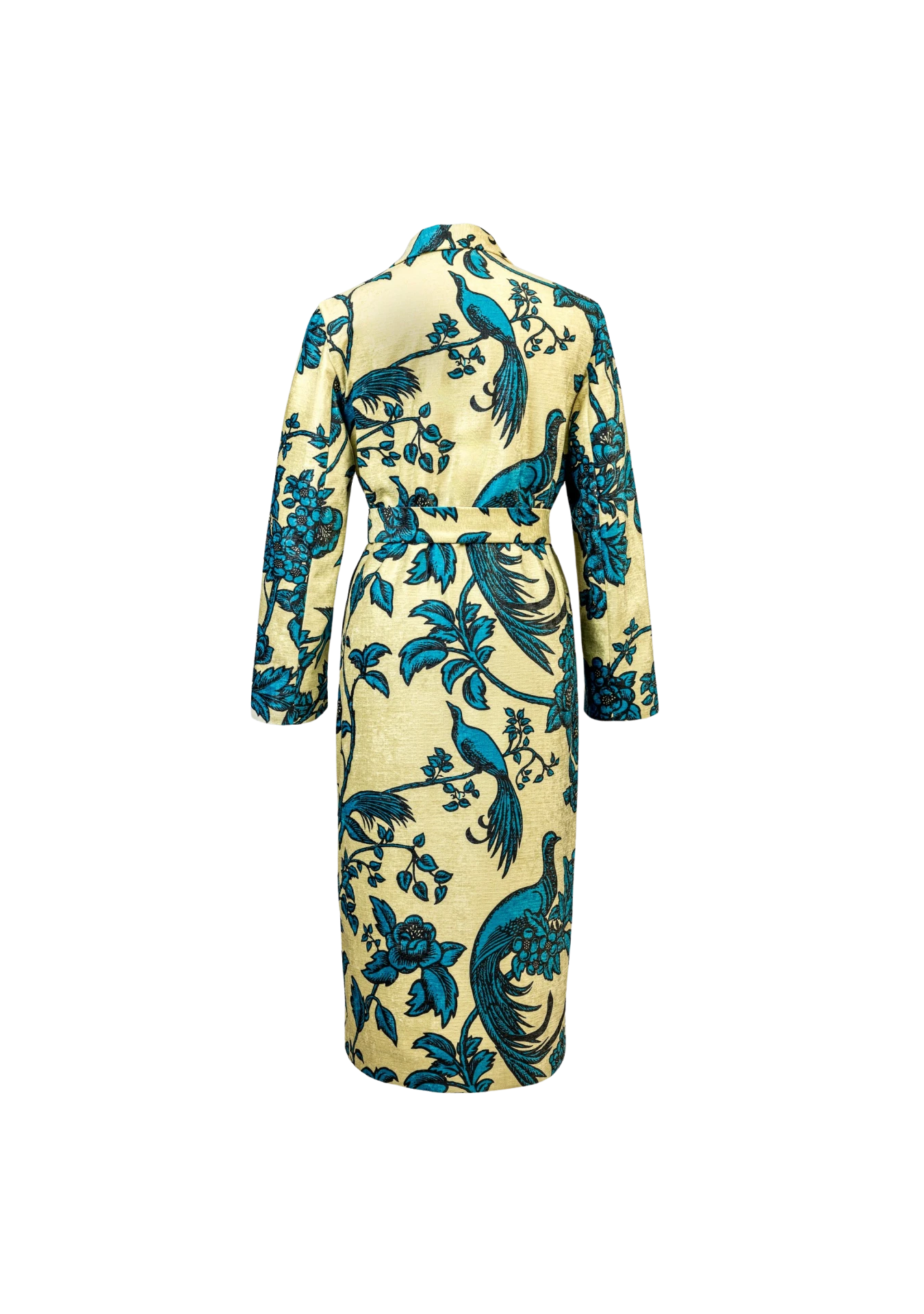 Back view of the Birds of Paradise Coat with signature turquoise birds on flax base, styled in Barcelona, Spain – limited edition outerwear by My Paloma.