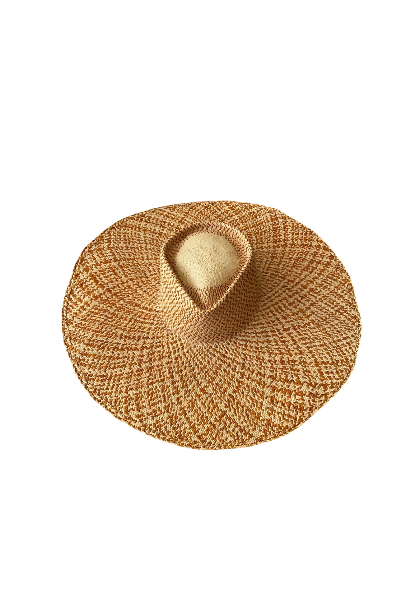Underside view of the Chalan Sunhat in Copper Beige, revealing the soft inner crown and tight woven pattern of artisan palm straw—ideal for elevated beachwear and resort looks.