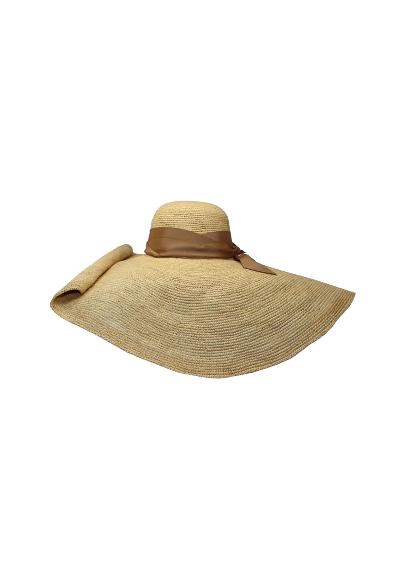 Natural straw oversized sunhat with a brown grosgrain ribbon and side bow; features a rolled edge for sculptural flair.