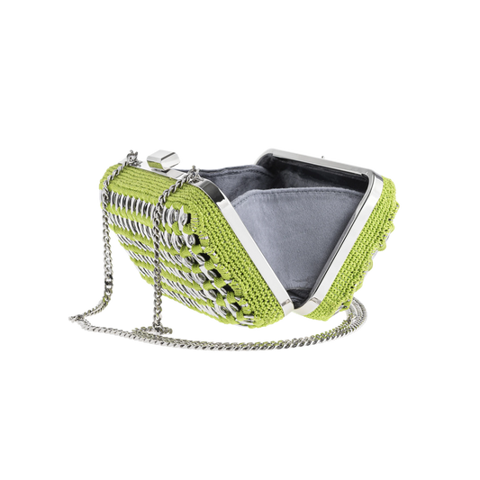 Interior view of the lime green crystal clutch bag, revealing a satin-lined compartment with secure clasp closure.