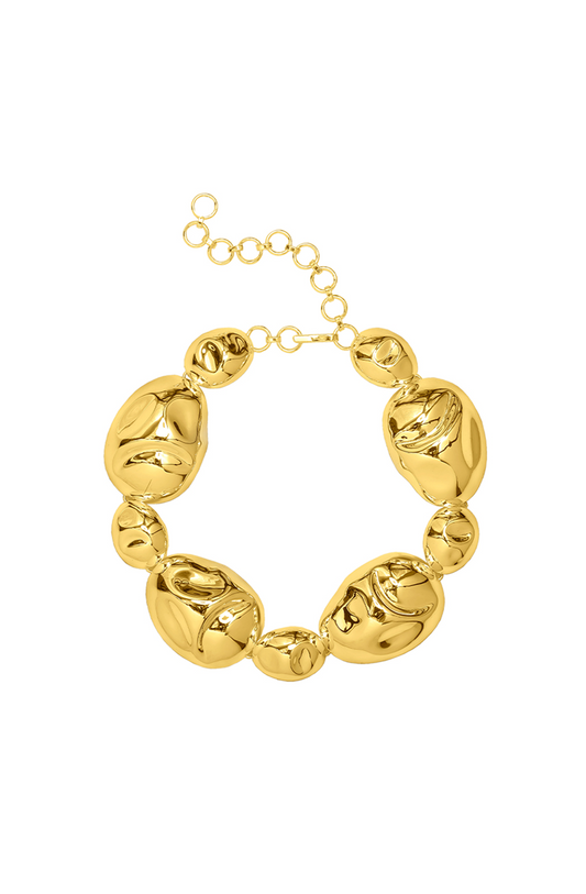 Bold statement necklace featuring oversized sculpted 24KT gold-plated brass beads with a hook and adjustable chain closure.