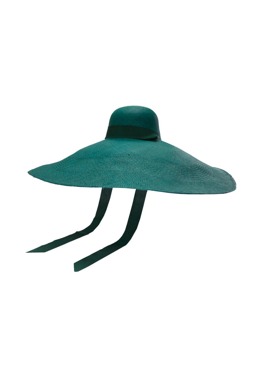 Lady Ibiza Hat in deep green, shown in a front-facing flat lay with wide, undulating brim and structured dome crown, accented by long ribbon ties—crafted for high-impact sunwear style.