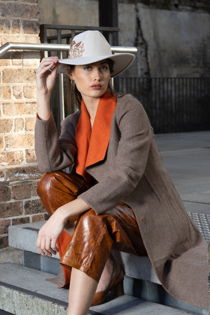 Front of Agnes Reversible Coat in warm brown with orange collar, photographed in Florence, Italy – collector’s outerwear by My Paloma.