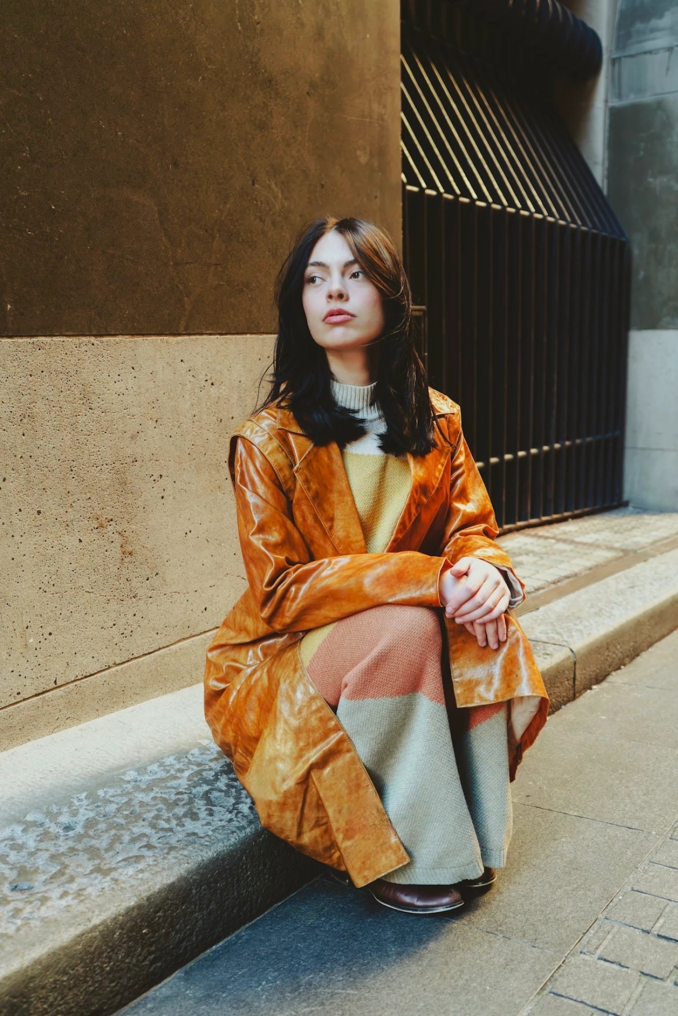 Girl wearing the My Paloma Sauce Coat in golden caramel finish, designed in Sydney, Australia – showcasing clean tailoring and timeless sophistication by My Paloma.