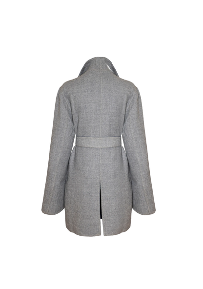 Rear view of the reversible Soho Coat in light grey alpaca blend, shot in San Francisco, USA – combining comfort and craft by My Paloma.


