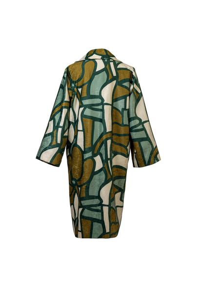 Back image of the Stained Glass Coat featuring bold archival print, shot in Berlin, Germany – wearable art from the My Paloma collection.