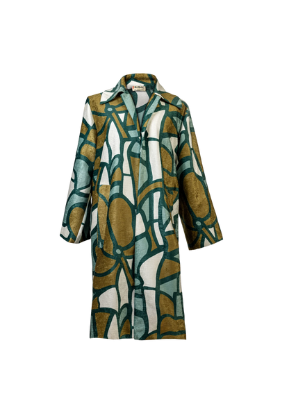 Front of the Stained Glass Coat with structured silhouette and vibrant green-gold print, photographed in Miami, Florida – heritage fashion reimagined by My Paloma.