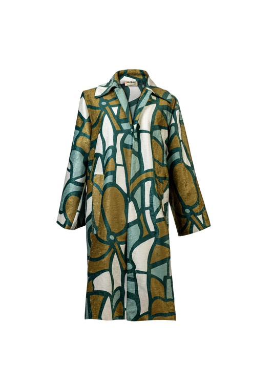 Front of the Stained Glass Coat with structured silhouette and vibrant green-gold print, photographed in Miami, Florida – heritage fashion reimagined by My Paloma.