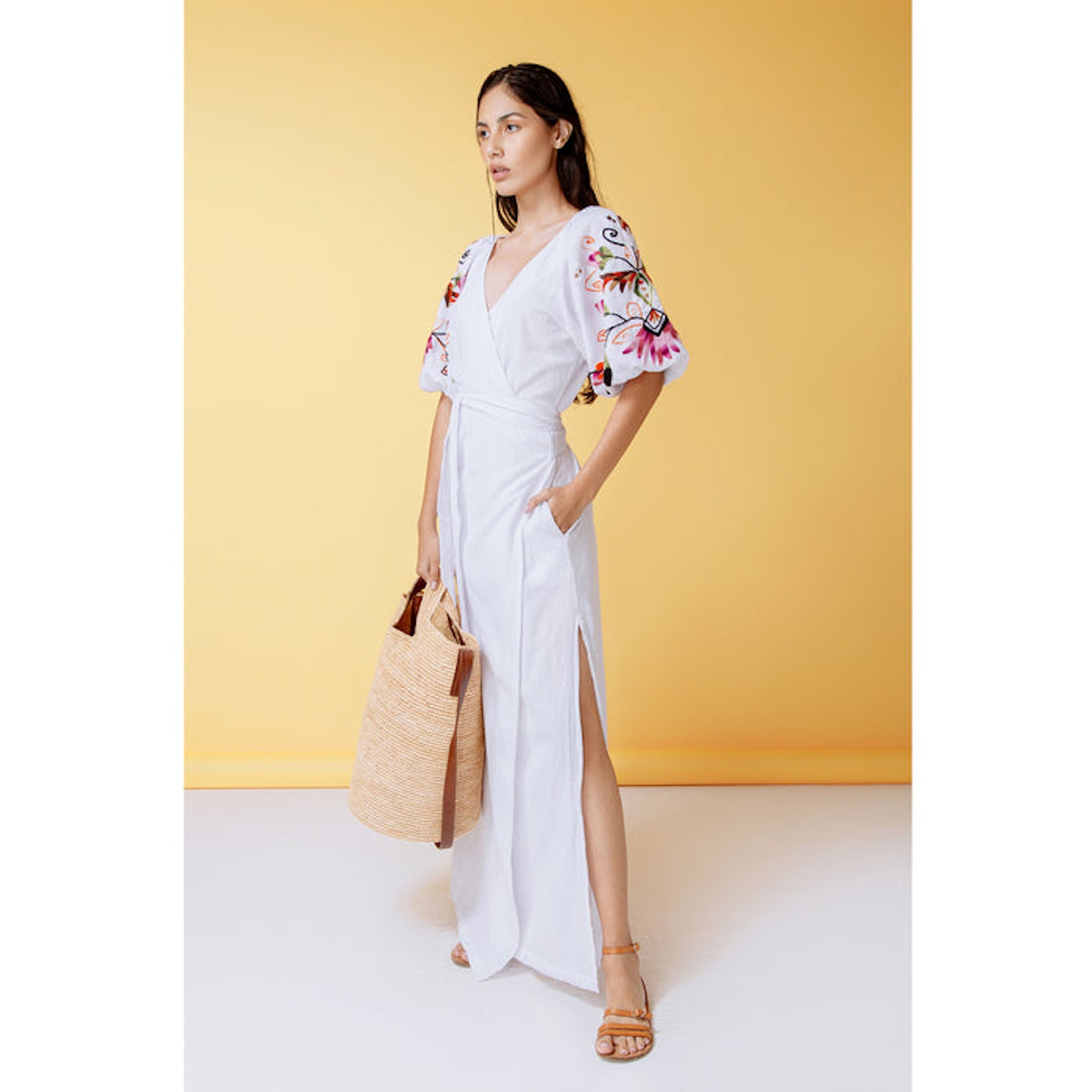 Tall bag with orange leather strap